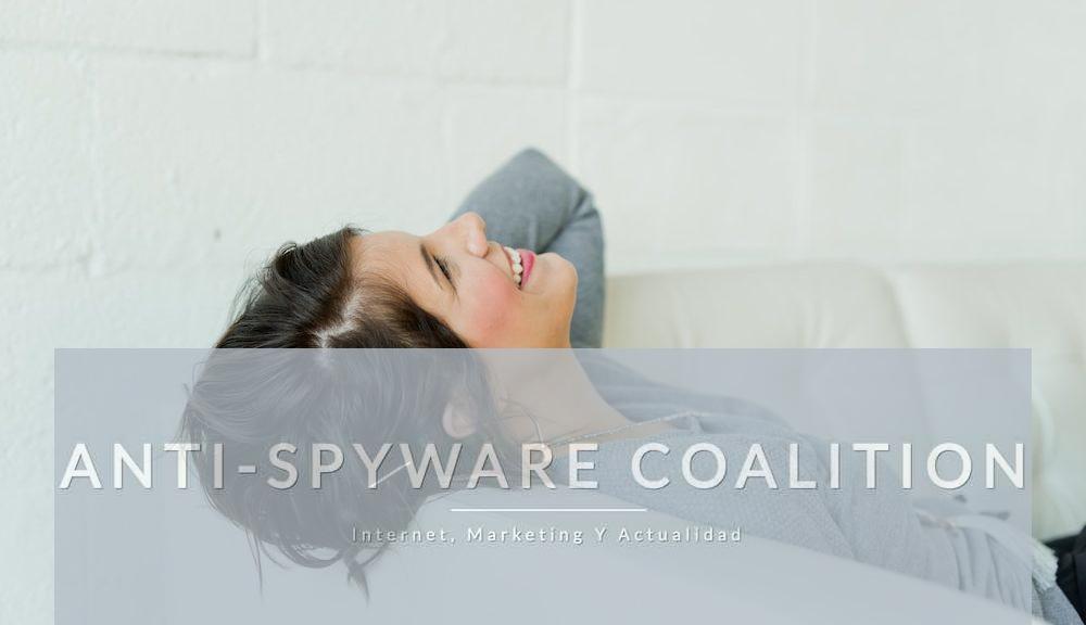 woman in gray long sleeve shirt lying on bed