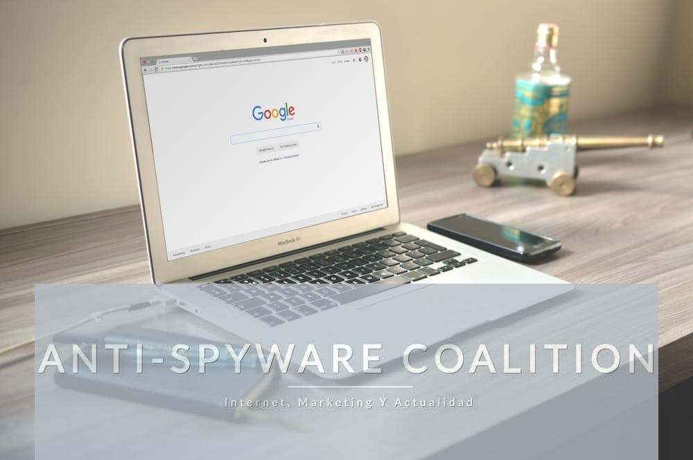 Macbook Air on Grey Wooden Table
