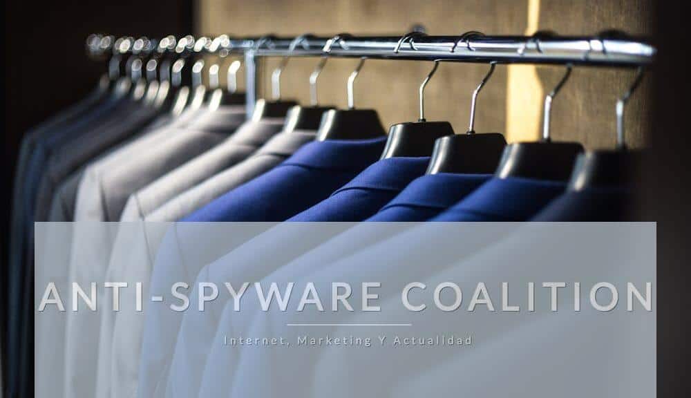 Close-up of neatly arranged suits in a wardrobe, showcasing fashion and organization.
