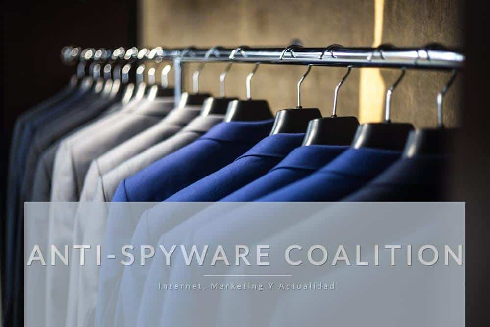 Close-up of neatly arranged suits in a wardrobe, showcasing fashion and organization.
